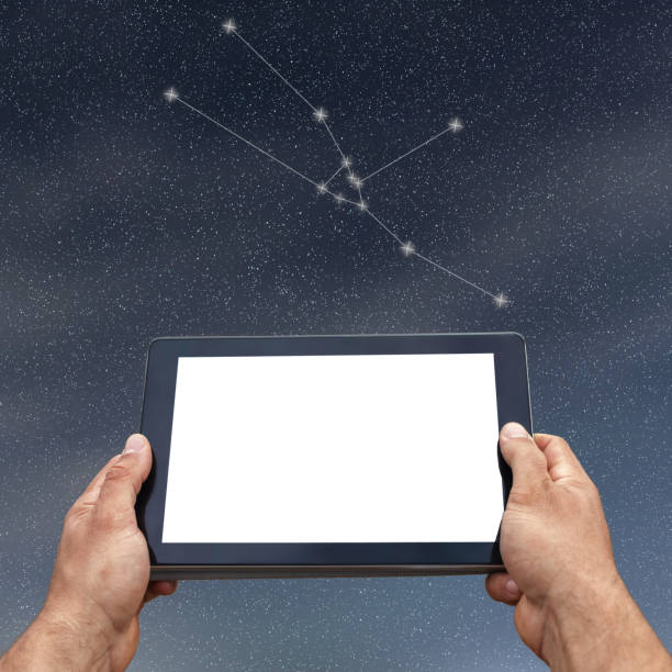 istock Astrology, horoscope, technology and people concept. Taurus Constellation. Zodiac Sign 858027476