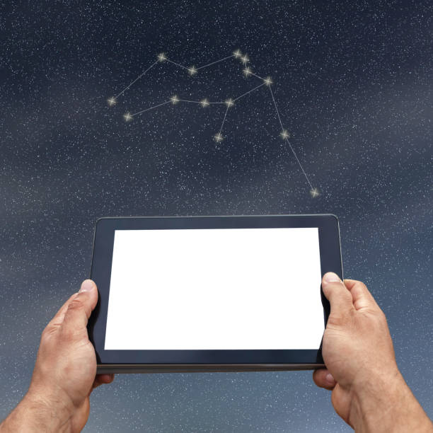 istock Astrology, horoscope, technology and people concept. Aquarius Constellation. Zodiac Sign 858031030