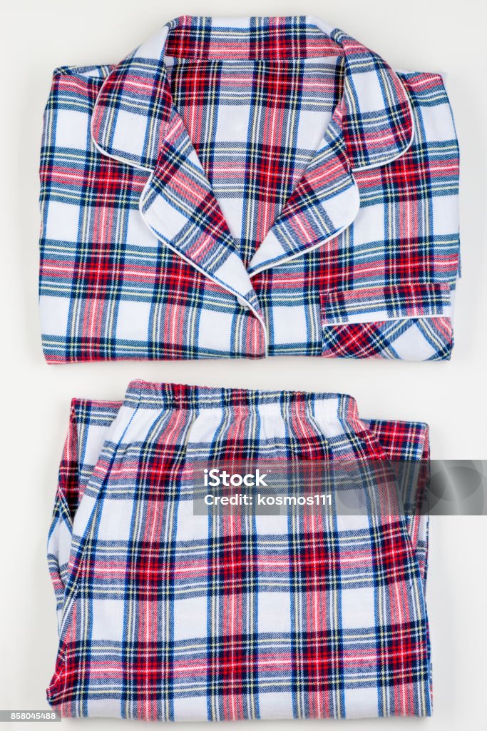 Checkered classic warm pajamas on white background closeup Pajamas Stock Photo