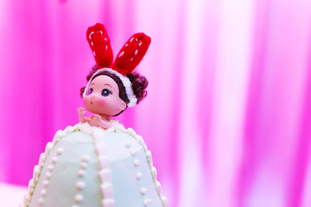beautiful colorful delicious cake with beautiful doll on birthday party