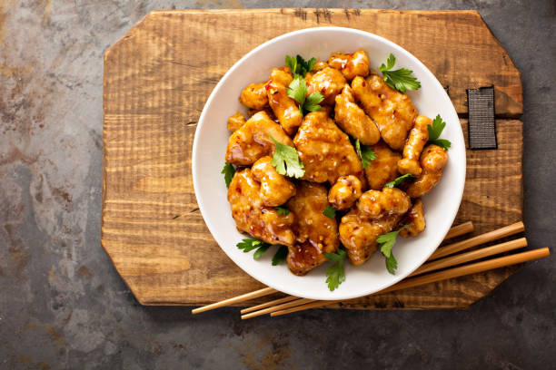istock Spicy sweet and sour chicken with rice and cabbage 858056352