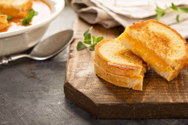 istock Grilled cheese sandwiches with white bread and cheddar 858061212