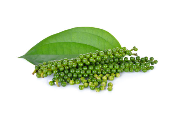 istock pile of fresh peppercorns with leaf on white background 858067794
