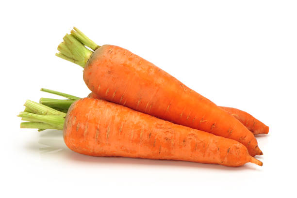 istock Heap of carrots isolated on a white background 858069040