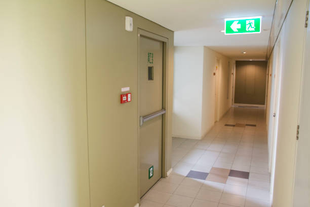 istock Fire escape sign at the corridor 858072672