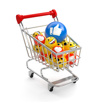 Shopping carts with balls smiles. Sale of likes in social media. white isolated background 3d render