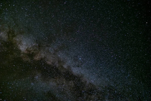istock milky way galaxy, Long exposure photograph, with grain. 858079288