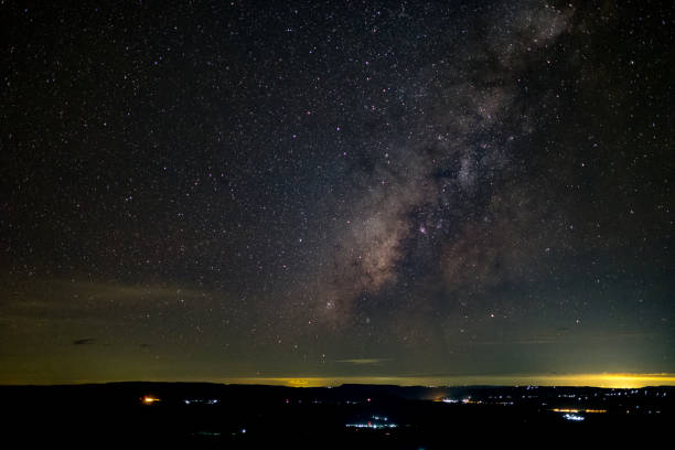 istock milky way galaxy, Long exposure photograph, with grain. 858079360