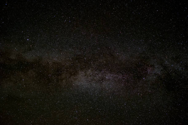 istock milky way galaxy, Long exposure photograph, with grain. 858079968