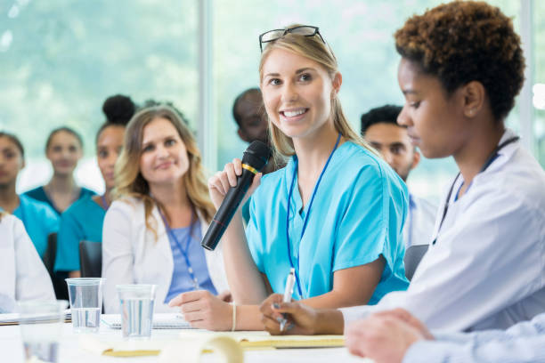 istock Confident female healthcare professional participates in panel discussion 858087792