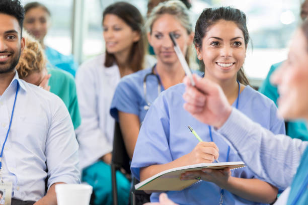 istock Unrecognizable healthcare professional makes a point during meeting 858087892