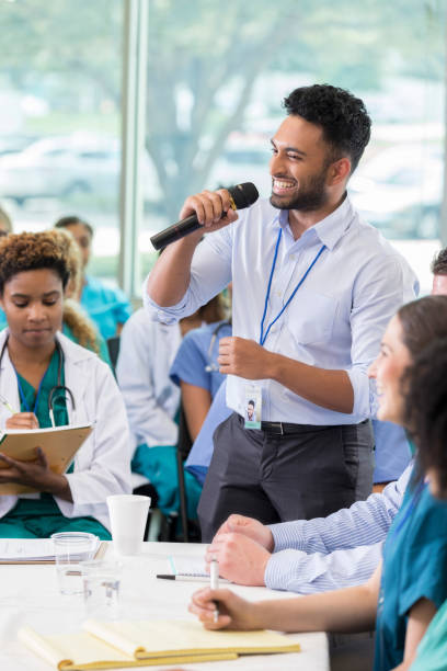 istock Healthcare professional facilitates panel discussion 858087936