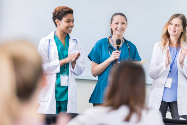 istock Confident diverse female medical professionals speak during conference 858087950
