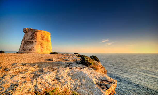 istock defense tower in punta prima (Formenetra) - Balearic islands 858096348