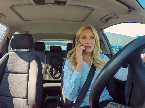 istock Businesswoman driving car 858103358