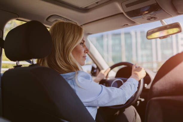 istock Businesswoman driving car 858103626