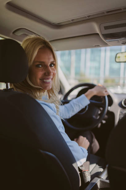 istock Businesswoman driving car 858103936