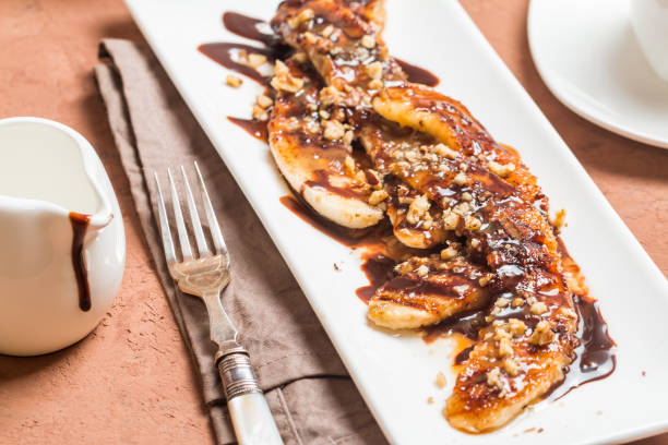 istock Grilled banana with chocolate sauce 858106392