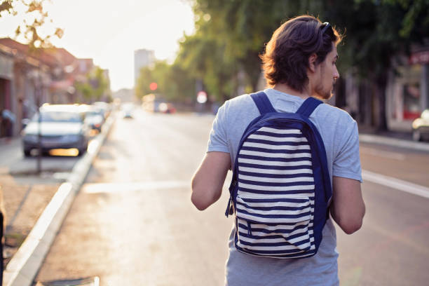 istock Man walking on the city street 858115370