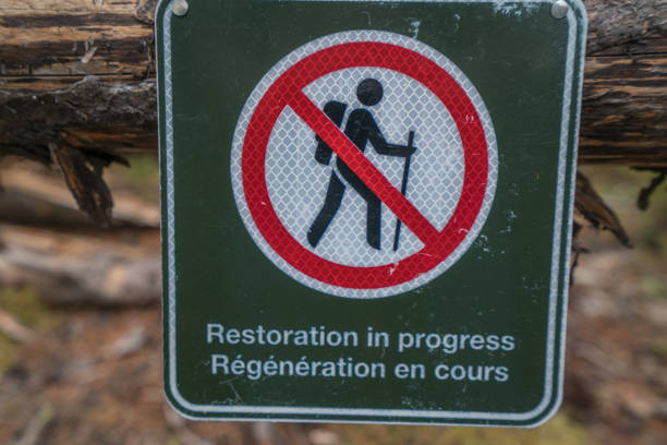 Close up view of a non hiking sign area for vegetation restoration
