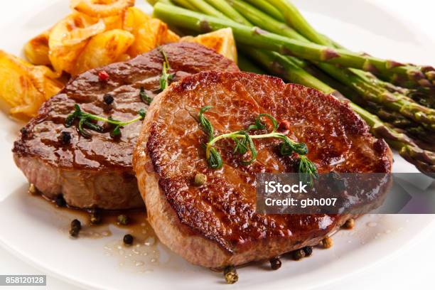 Grilled Steak With Asparagus Stock Photo - Download Image Now - Pork, Steak, Sirloin Steak