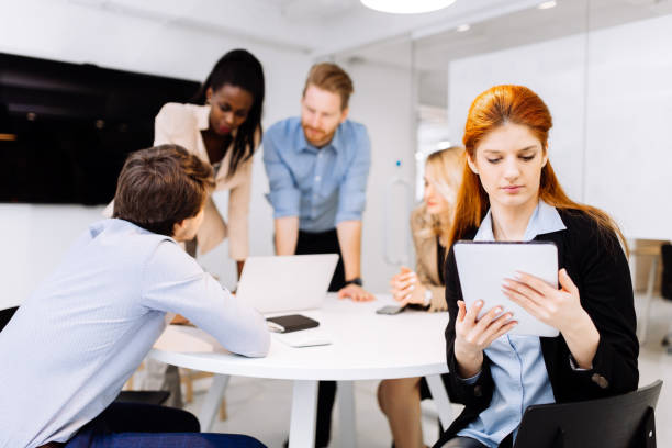 istock CEO of company holding tablet 858123308