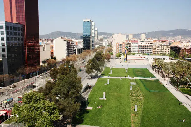 Photo of Barcelona, Spain - 16 April 2014 . Park, Parc Joan Miro. Behind Bullring Arenas shopping mall in Placa Espanya in Barcelona