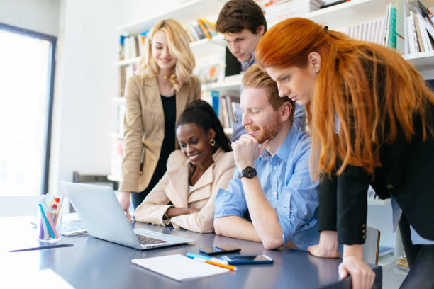 istock Business people brainstorming in office at desk 858123424