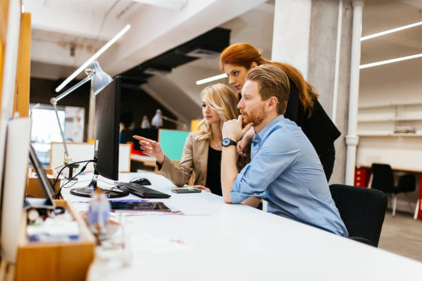 istock Designers working as a team in office 858123466