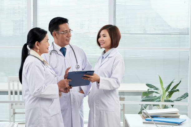 istock Consulting with coworkers 858126342