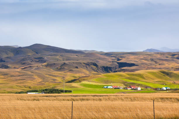 istock Mountains landscape with Icelandic Houses 858127286