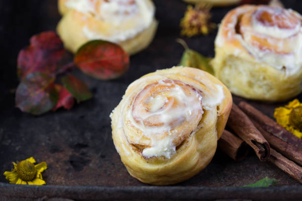 istock fresh pumpkin cinnabon buns with cinnamon and frosting 858128208
