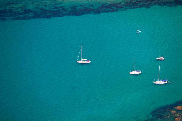 istock Turquoise sea and white yachts 858128428