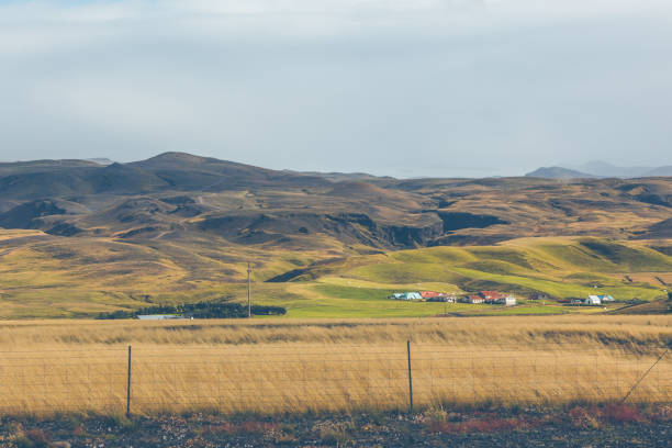 istock Mountains landscape with Icelandic Houses 858131378