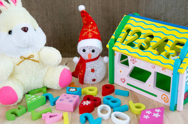 istock Children toy with doll and snowman, 858131526