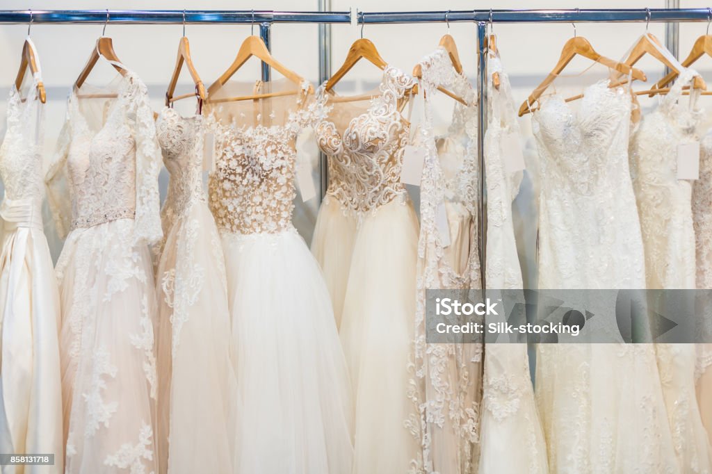 Many beautiful wedding dresses Many beautiful wedding dresses hang in the store Wedding Dress Stock Photo