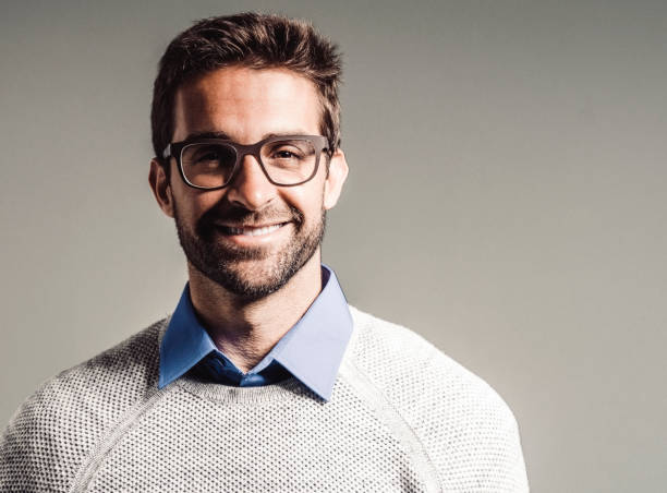 istock Smiling handsome man wearing eyeglasses 858135264