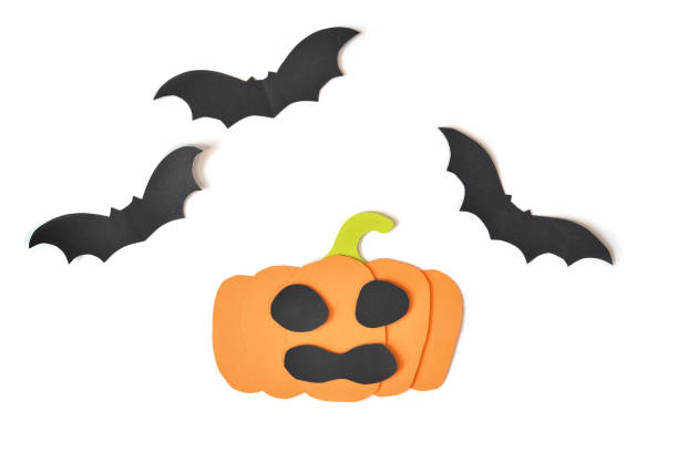 istock Halloween pumpkin with bats on white background 858136076