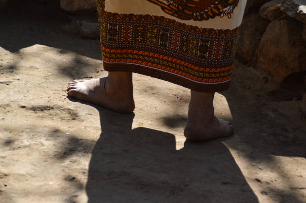 istock Nepalese woman walking barefoot 858140162