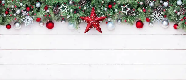 Photo of Fir Branches And Decoration On White Plank - Christmas Border
