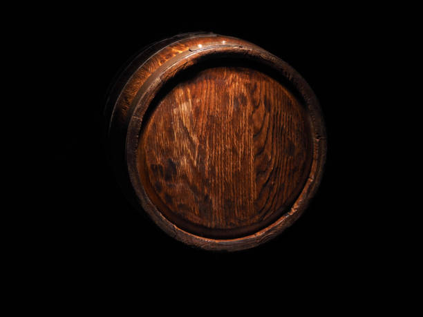 istock Rustic wooden barrel on a night background 858144816