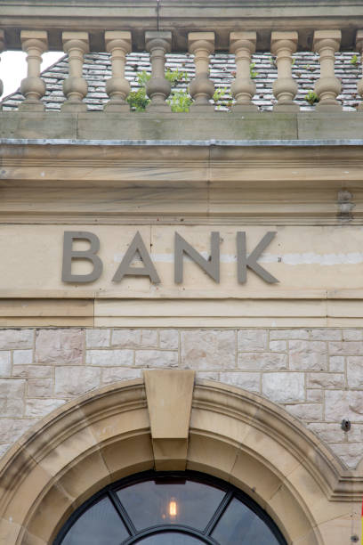istock Bank Sign on Stone Wall Facade; England 858151266