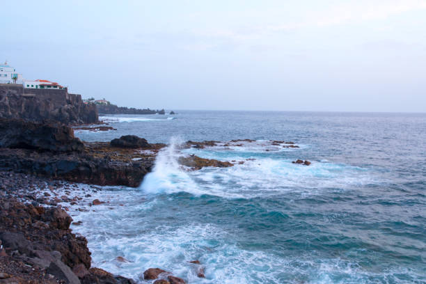 istock Big stormy ocean wave. Blue water background. 858164372