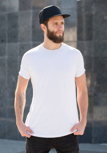 istock Hipster handsome male model with beard wearing white blank t-shirt 858164492