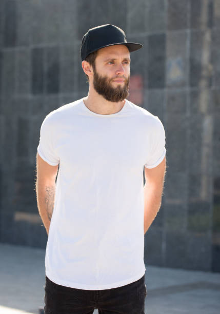 istock Hipster handsome male model with beard wearing white blank t-shirt 858164570