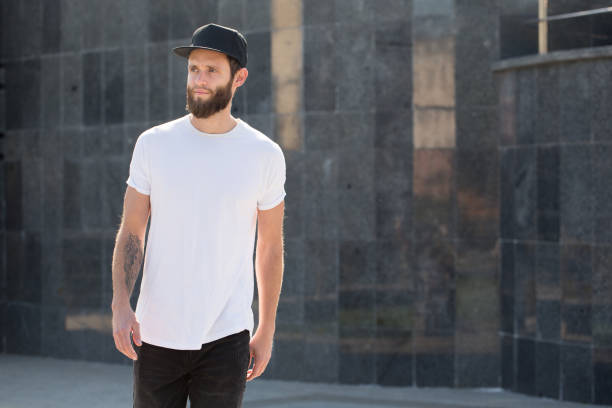 istock Hipster handsome male model with beard wearing white blank t-shirt 858164662
