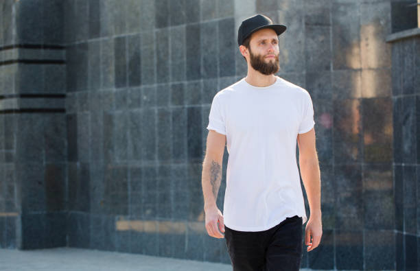 istock Hipster handsome male model with beard wearing white blank t-shirt 858164898