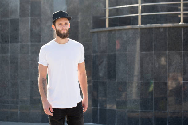 istock Hipster handsome male model with beard wearing white blank t-shirt 858164976