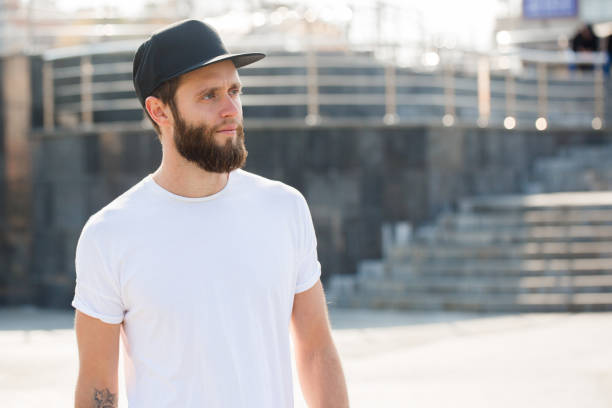 istock Hipster handsome male model with beard wearing white blank t-shirt 858165066
