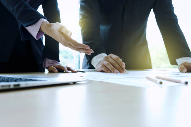 istock Businesswoman present a project plan to Businessman concept working 858165370